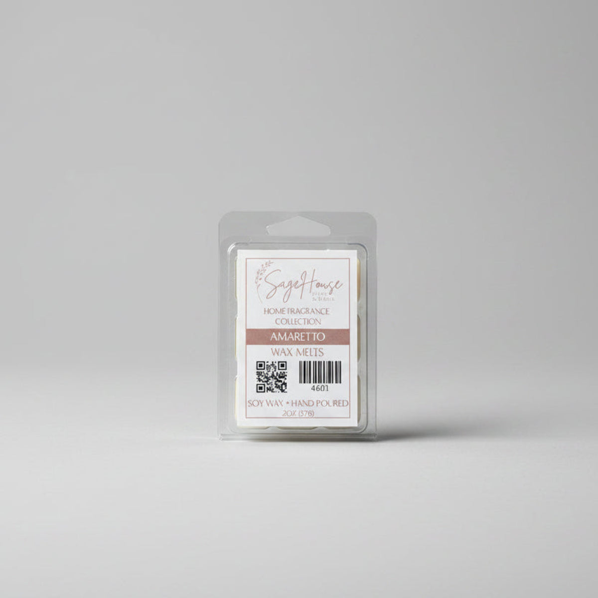 A clear clamshell container holding 6 wax melt cubes with a label on top, placed on a wooden surface against a wooden background.