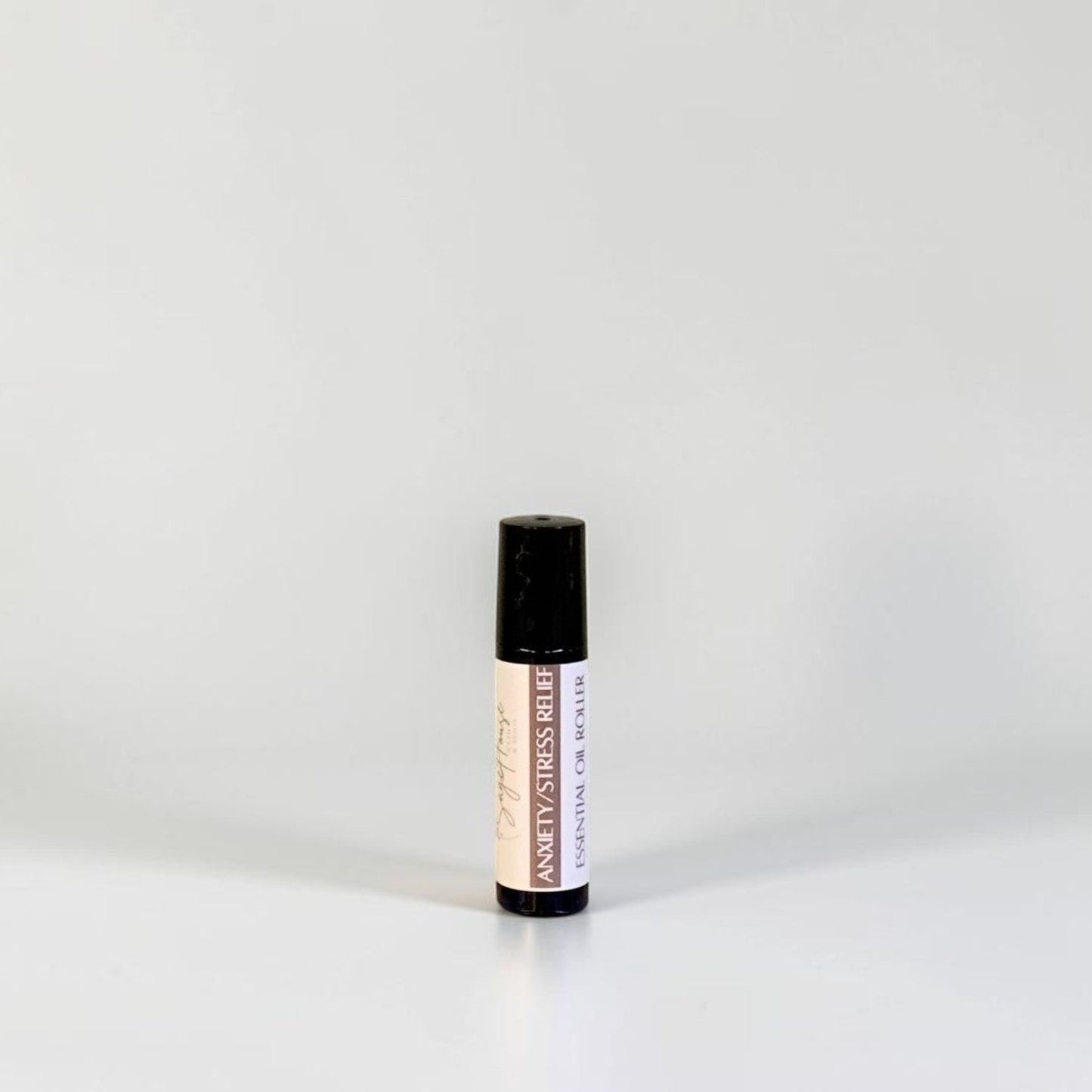 A roller bottle with label. On a white background.