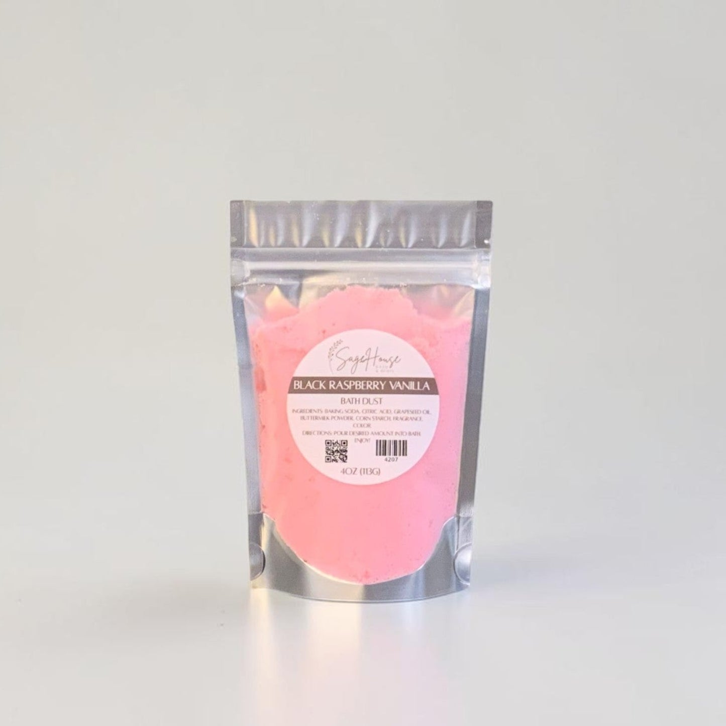 Pink powder in a clear plastic bag with a label on a white background
