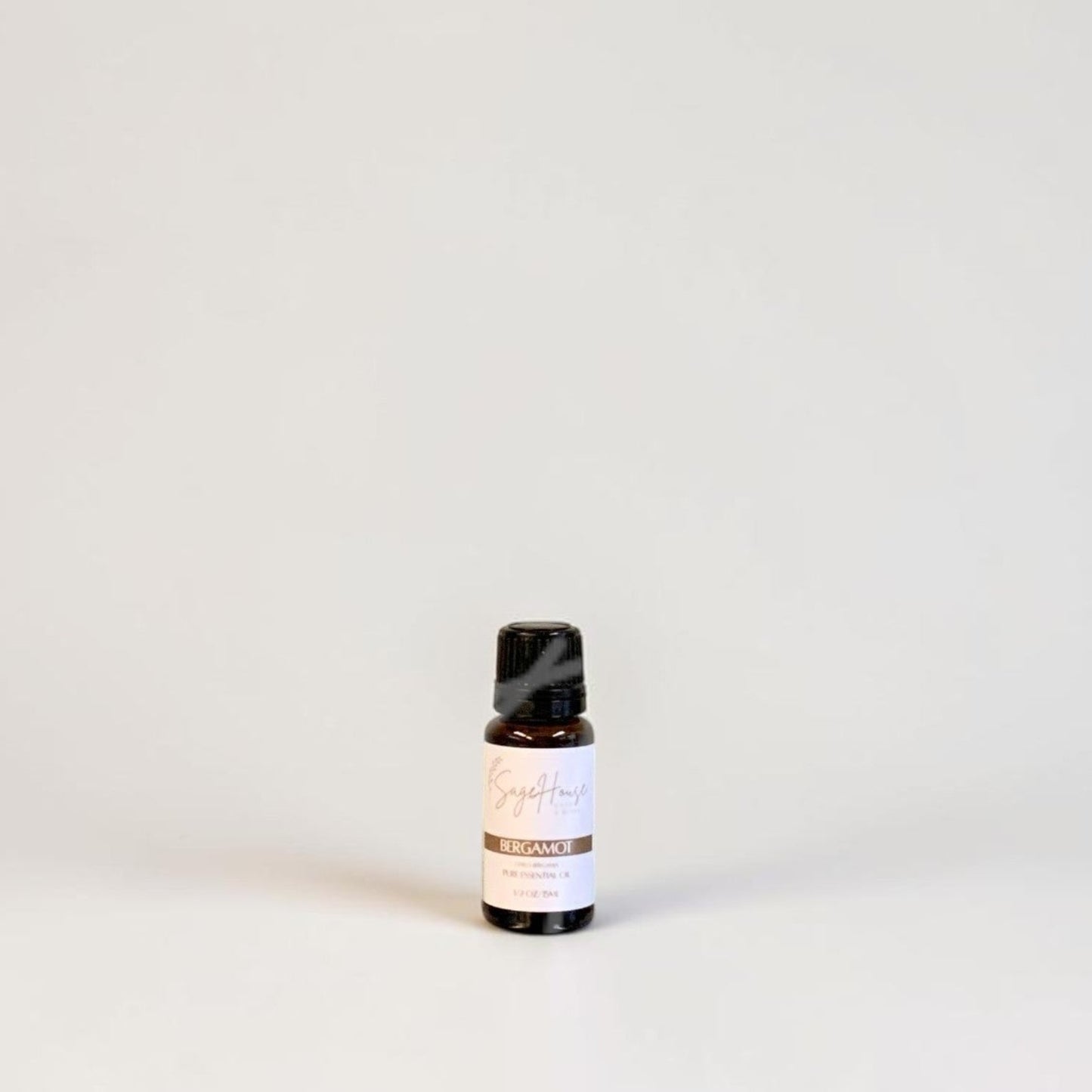 Amber bottle with label on a grey background.