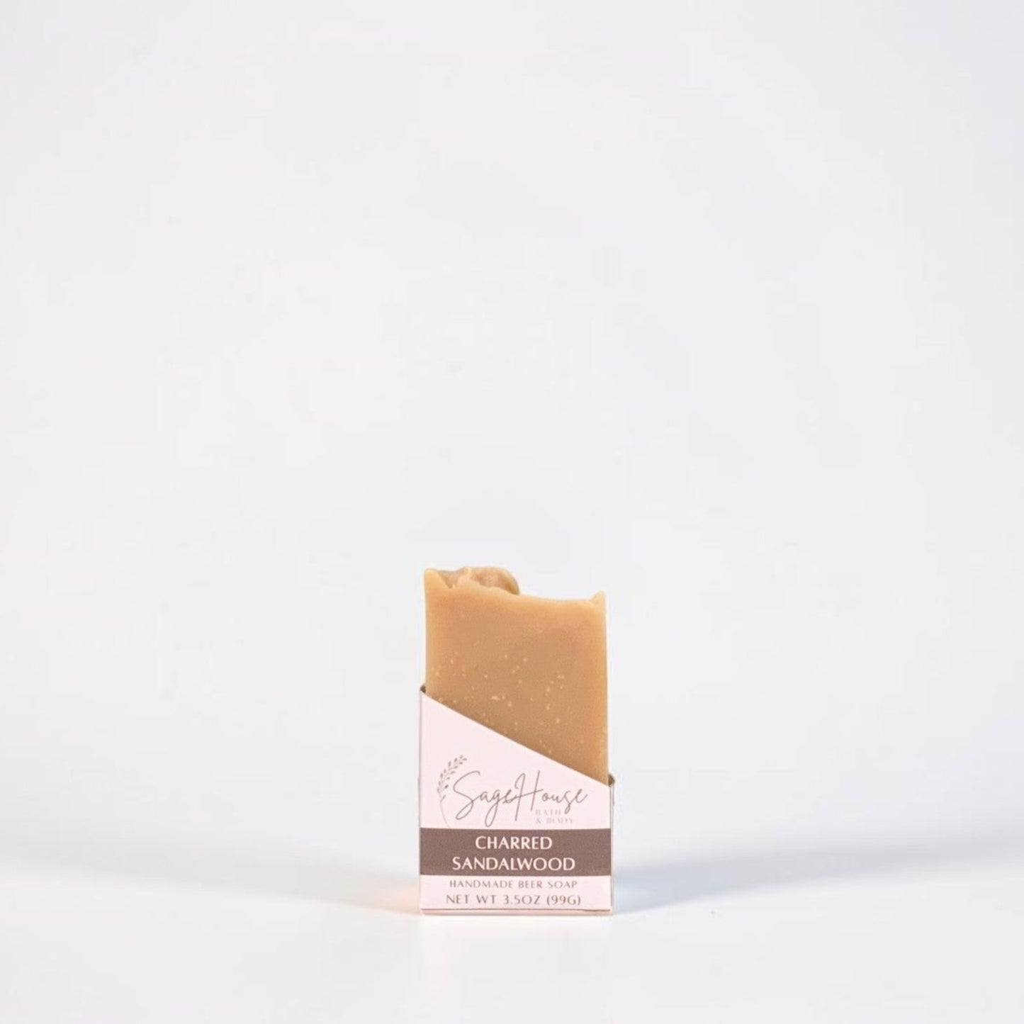 A bar of labeled soap on a white background.