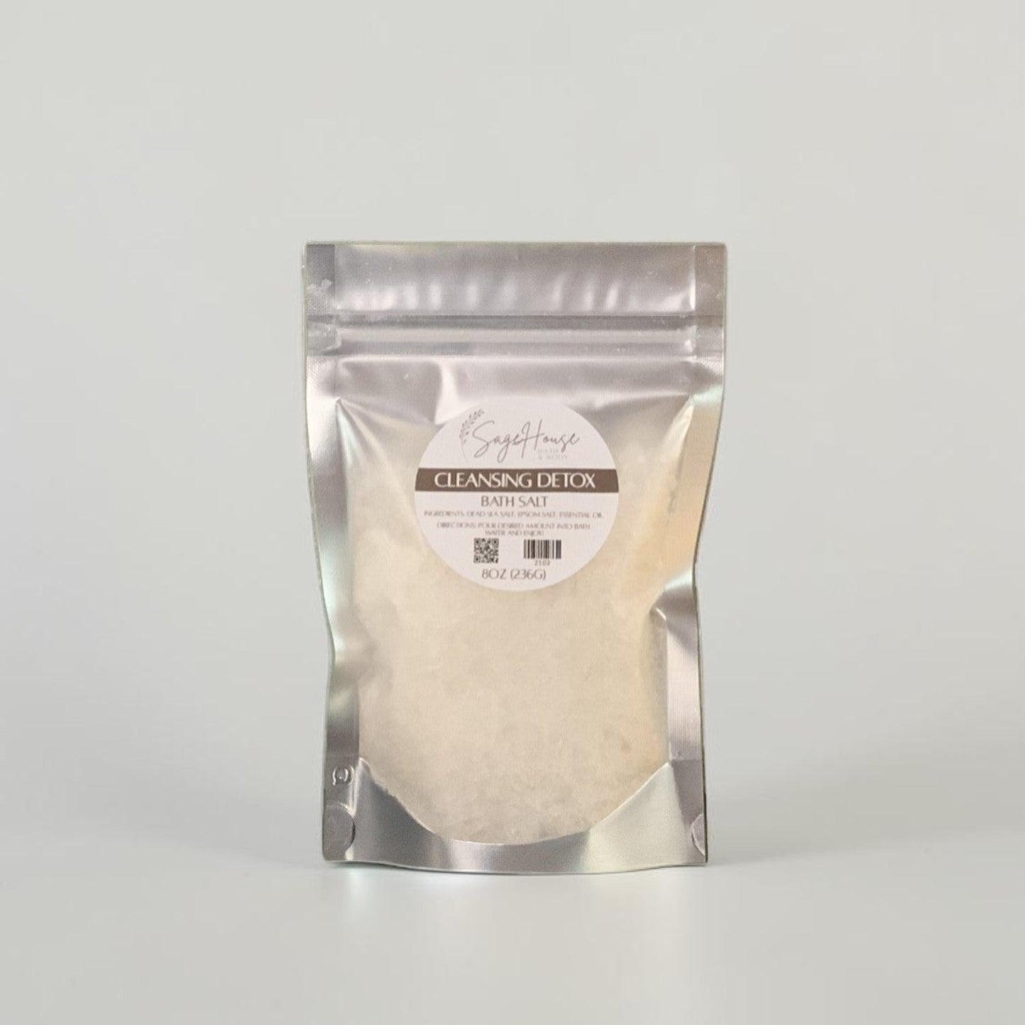 Silver packaging of a cleaning product on a white background