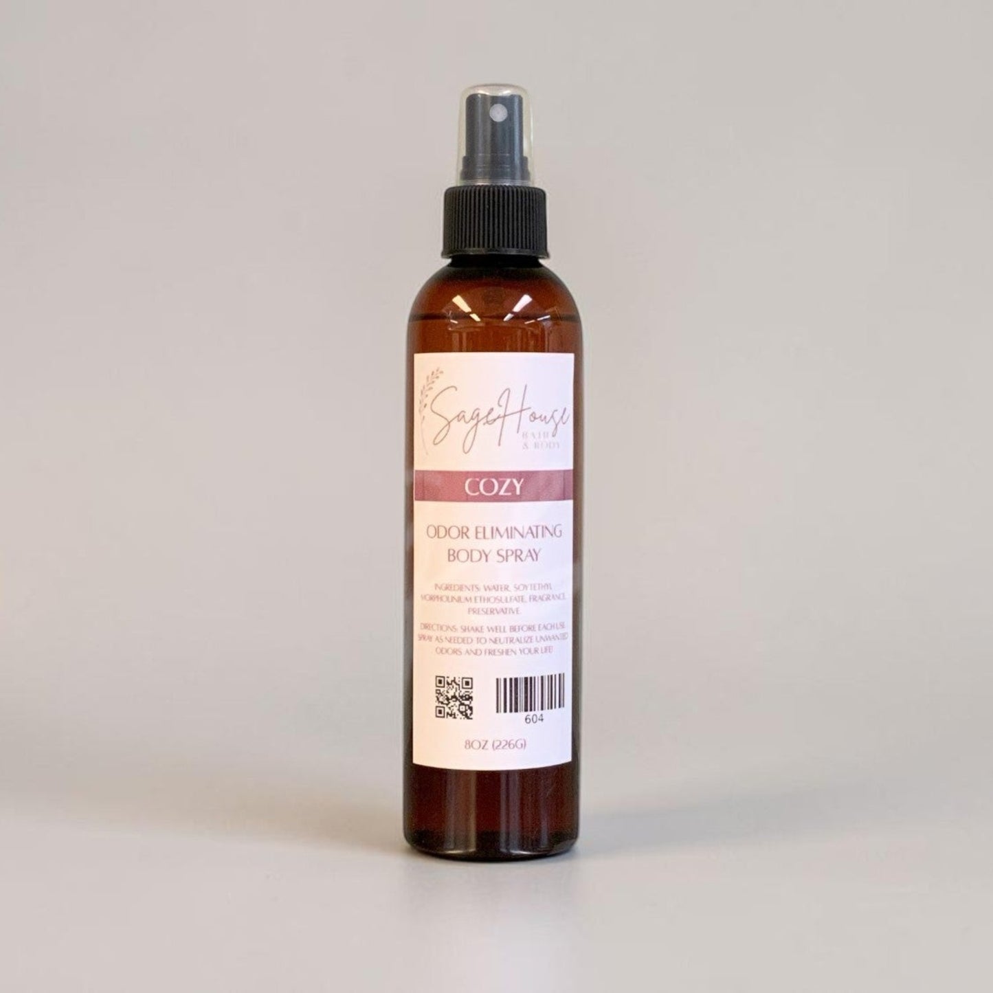 Bottle of body spray on a white background