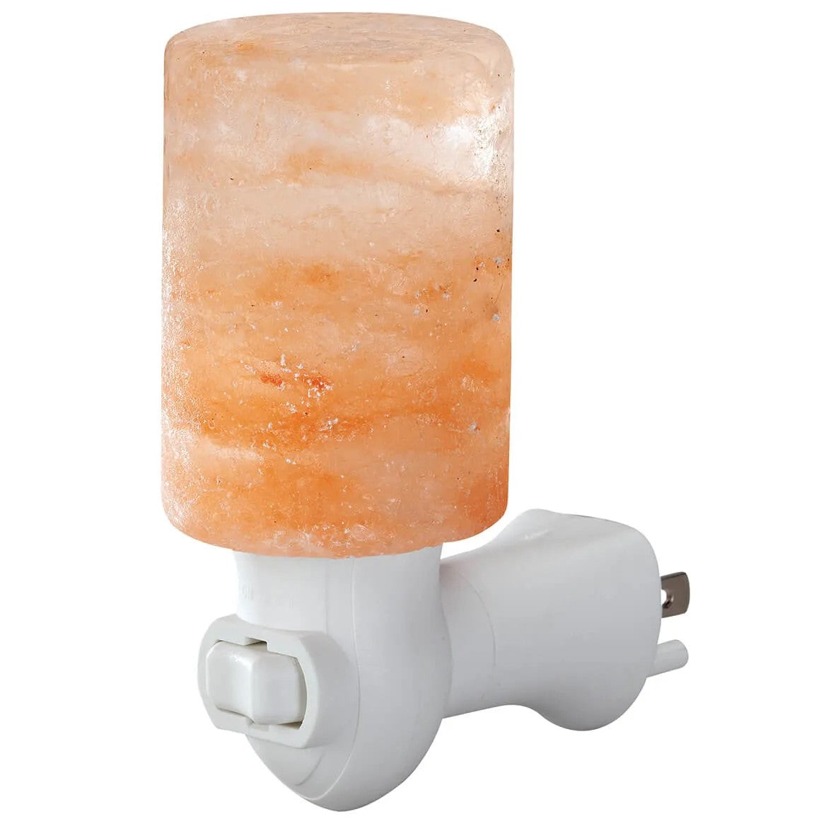 A small pink Himalayan salt lamp with a cylindrical shape. Fitted onto a night light plug in base