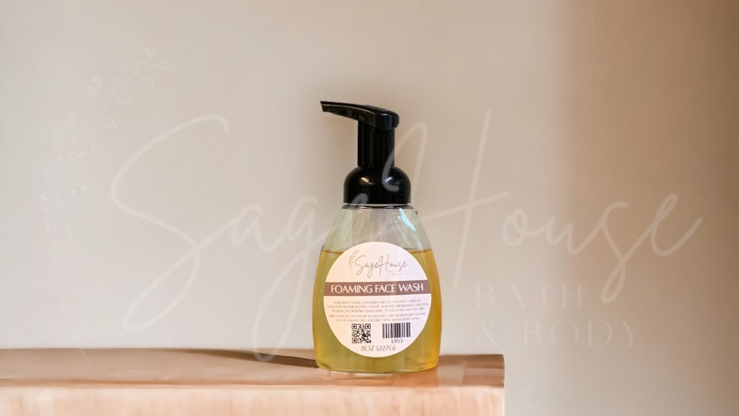 A clear plastic pump bottle containing yellow liquid, with a black pump dispenser, placed on a wooden surface against a neutral background.