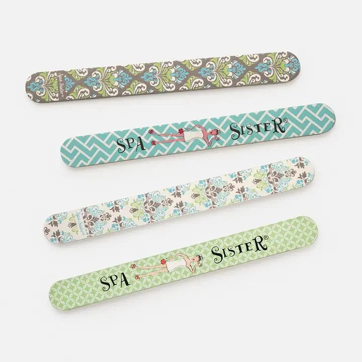 A set of four emery boards with various green and multicolor floral patterns.