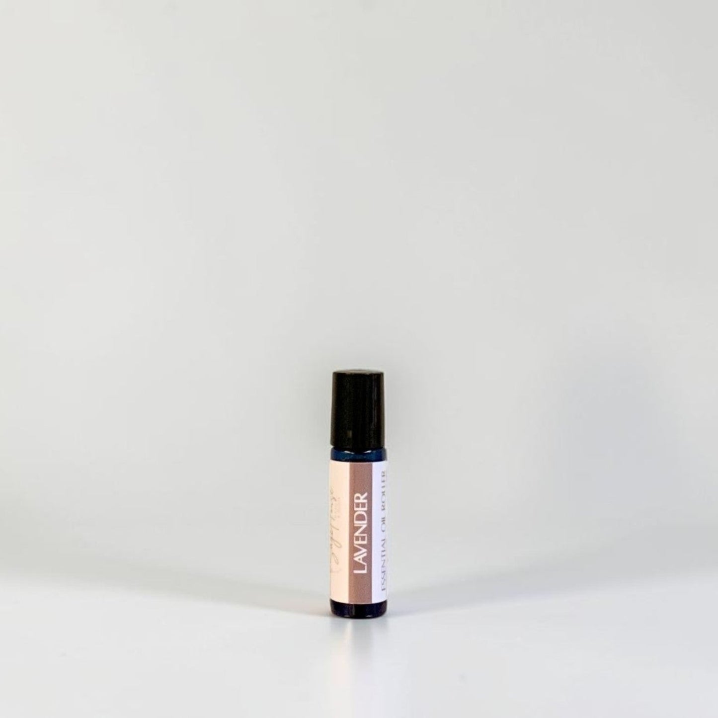 A roller bottle with label. On a white background.
