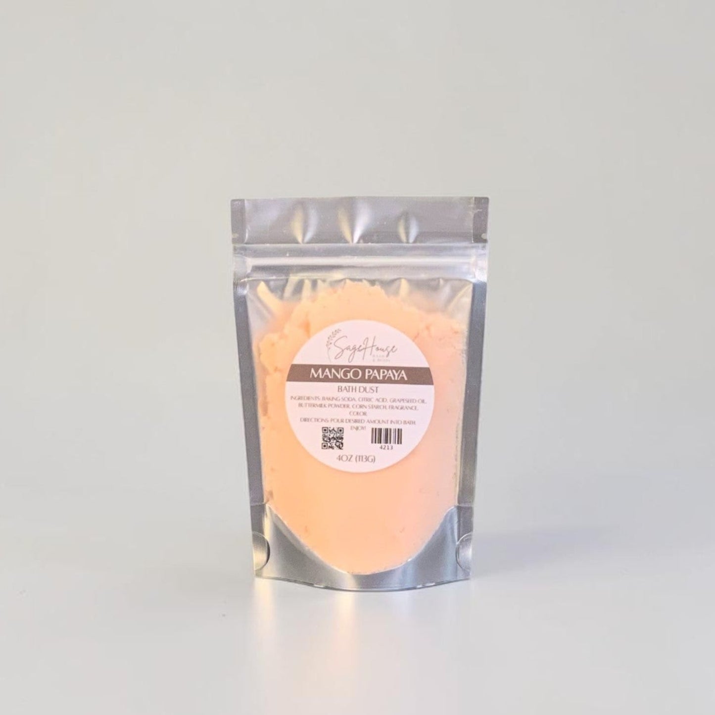 Clear packaging with peach-colored powder on a light gray background
