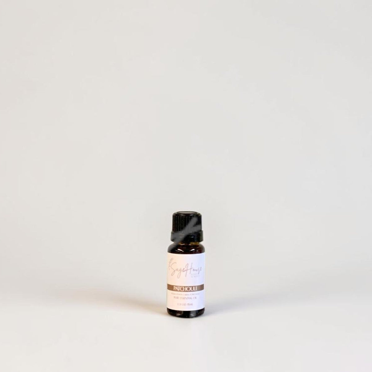 Amber bottle with label on a grey background.