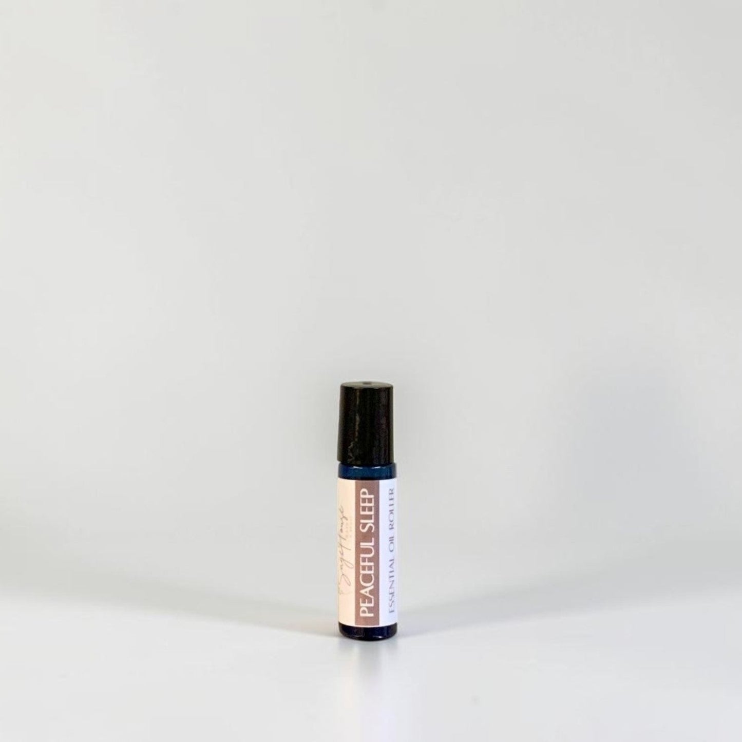 A roller bottle with label. On a white background.
