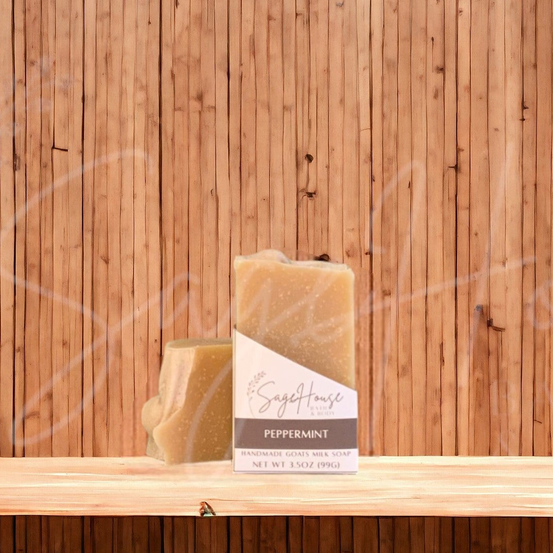 A tan colored bar of soap with a white label. on a wood surface.