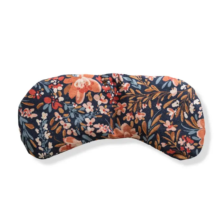 Floral-patterned eye mask on a white background