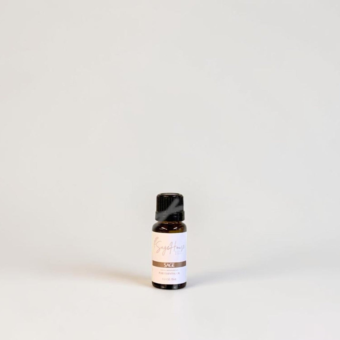 Amber bottle with label on a grey background.
