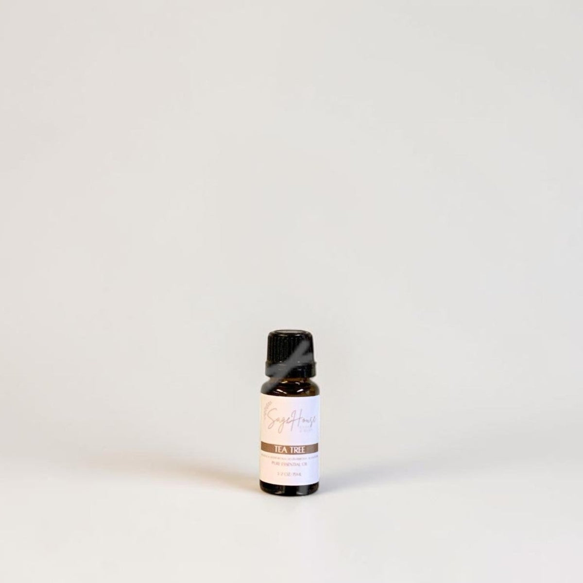 Amber bottle with label on a grey background.