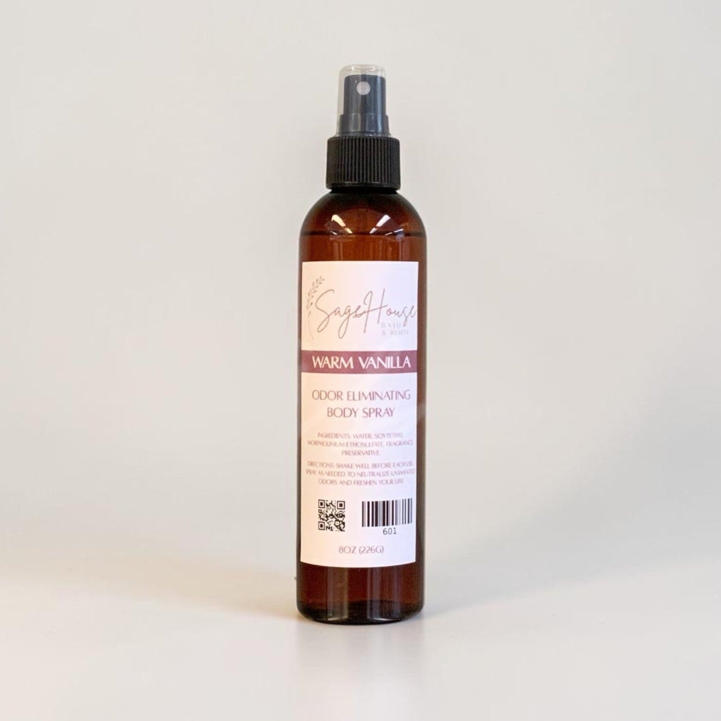 Bottle of body spray on a white background