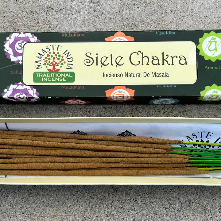 7 Chakra Incense packaging displayed on a stone background.