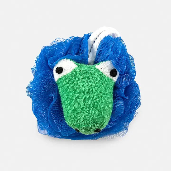 A blue alligator-shaped scrubbie with a green and white face, designed for use as a bath sponge.