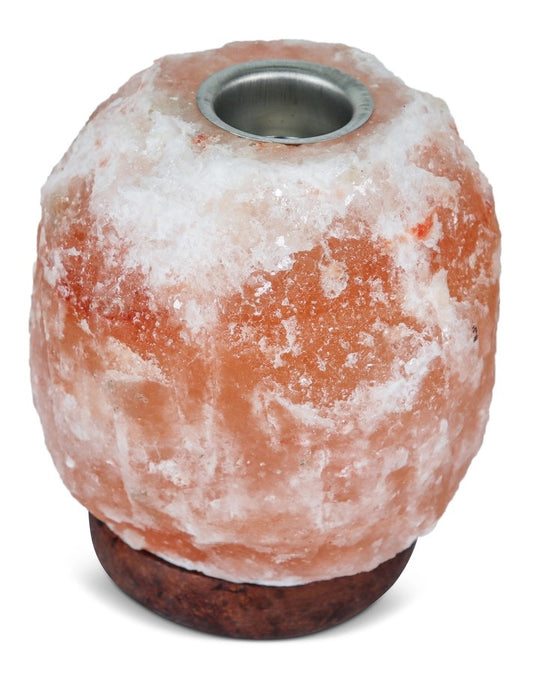 A pink Himalayan salt lamp with a top dish for holding essential oils.