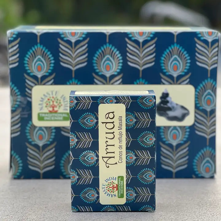 Small box of incense cones, with larger box behind with a nature background