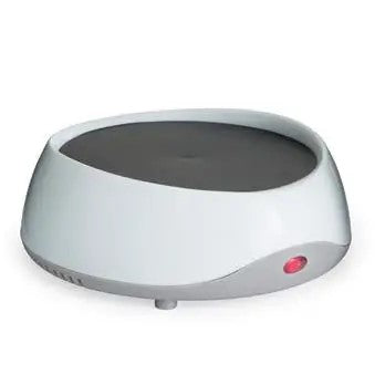 white and gray base with a warming plate on top. used for melting candles