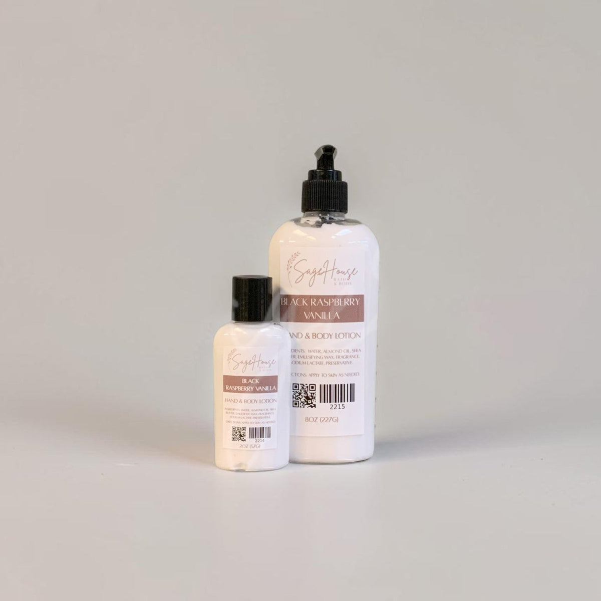 Two bottles of lotion with black caps and white labels. On a white background.