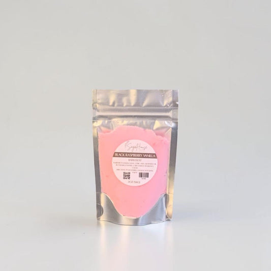 Pink product in a clear packaging bag on a light gray background