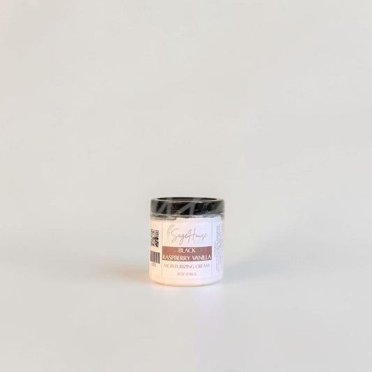 A labeled jar with a black lid. On a neutral background.