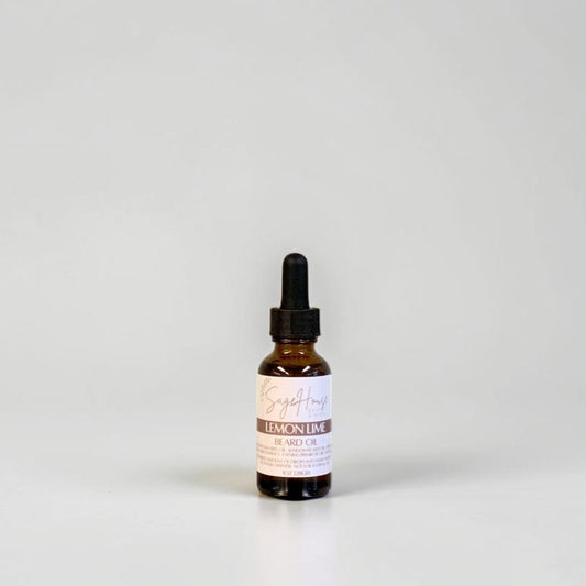 A small amber glass dropper bottle with a black dropper cap and a white label, centered against a plain light gray background.