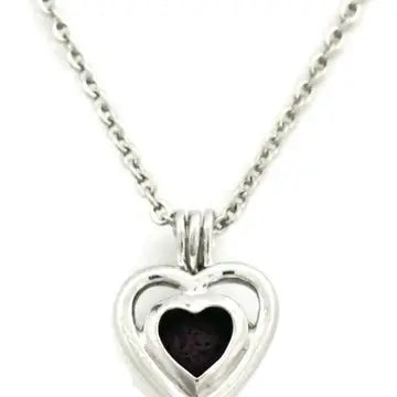 A silver heart shaped necklace with lava bead inside. on a silver chain