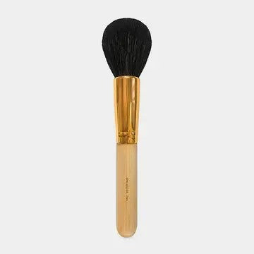 A single makeup brush with a gold-colored handle and black bristles, designed for applying powders and liquids.