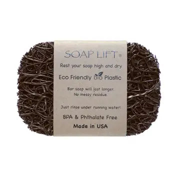 A brown soap lift with product band around the middle. On white background.