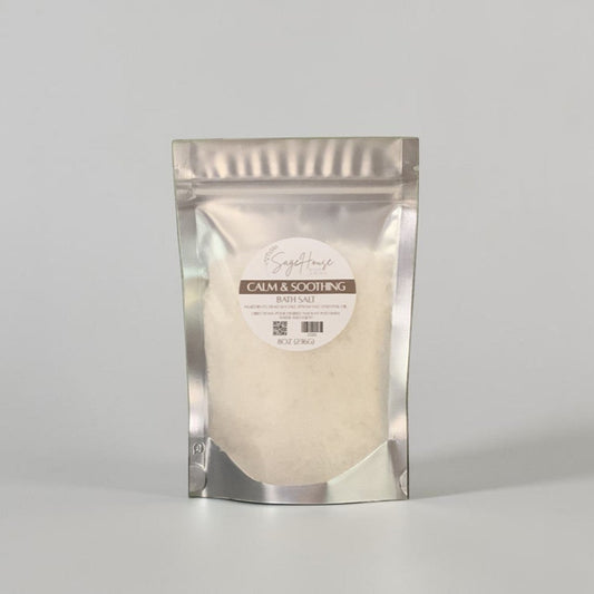 Silver packaging with a label on a grey background.