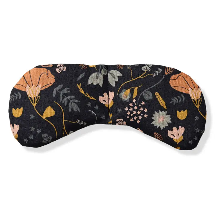 An eye mask therapy pack with a floral pattern in multicolor, primarily in shades of orange, green, and peach, displayed on a white background.