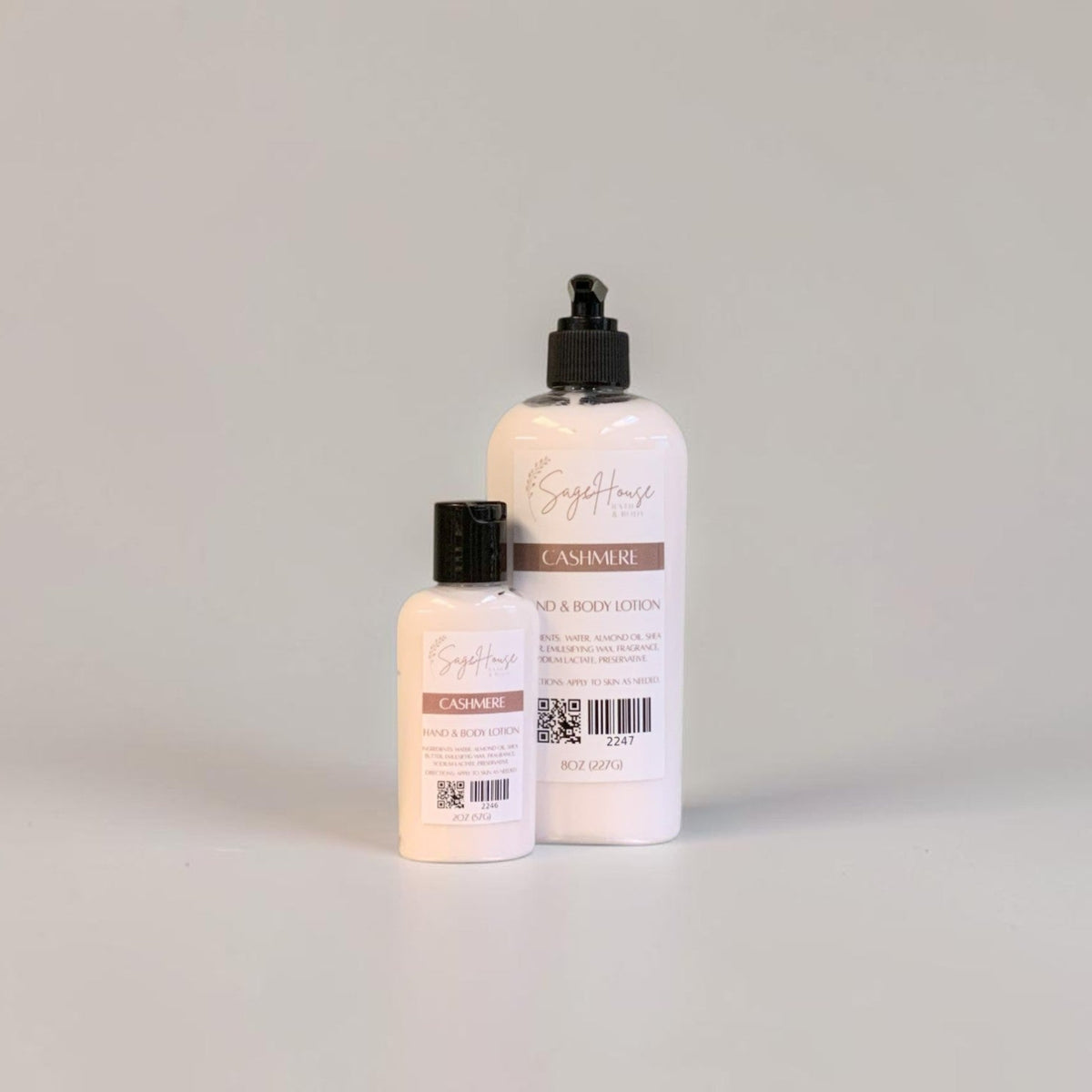 Two bottles of lotion with black caps and white labels. On a white background.