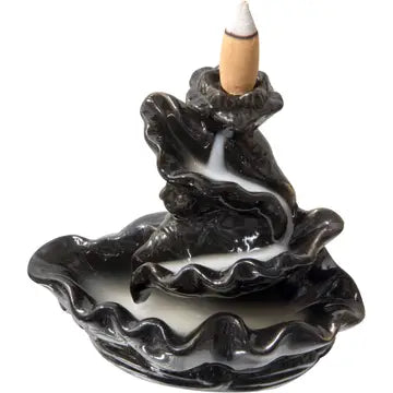 A cone incense burner shaped like a winding waterfall, with a waterfall of smoke going down into the attached bowl. On a white background.
