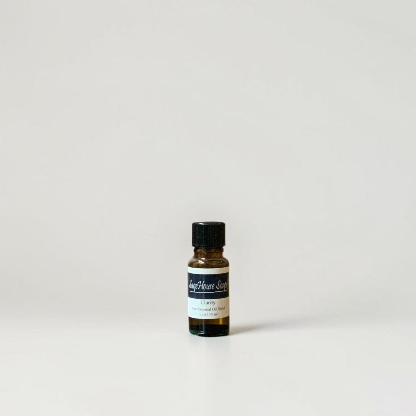 Amber bottle with label on a grey background.