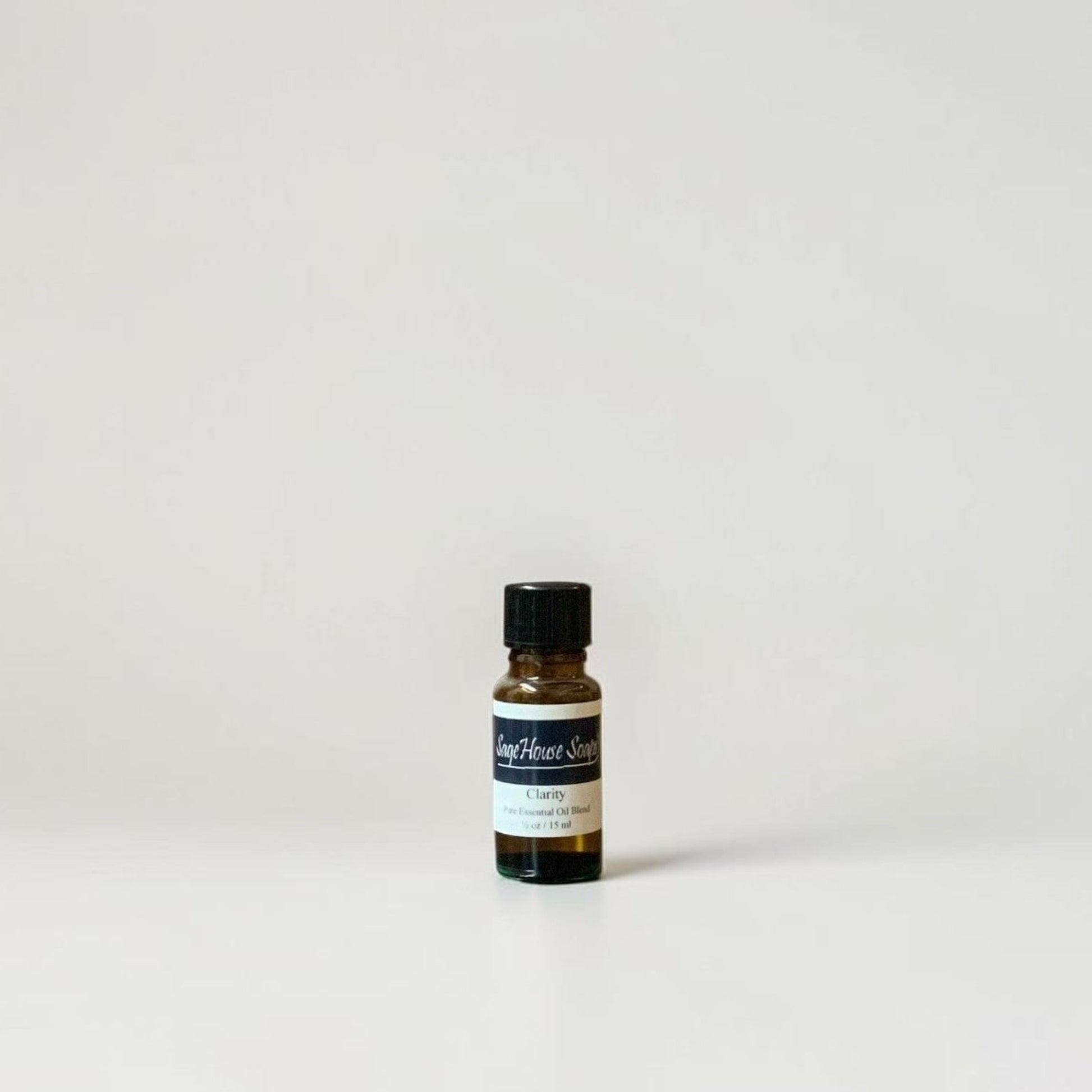 Amber bottle with label on a grey background.