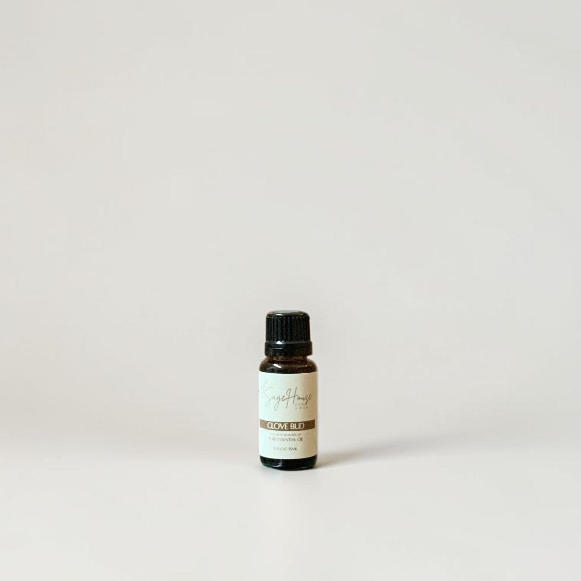 Amber bottle with label on a grey background.