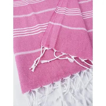 Dark Pink Turkish cotton towel, folded onto itself, on a white background.