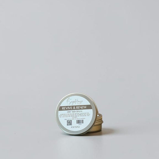 Small cylindrical container with a label on a light gray background