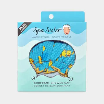 A blue shower cap with a yellow rubber duck print, inside a package. on a white background