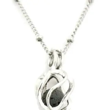 A silver circular shaped necklace with lava bead inside. on a silver chain