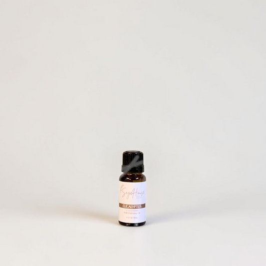 Amber bottle with label on a grey background.
