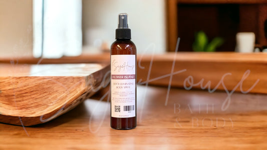 An amber colored bottle with spritz top. On wooden surface with modern background