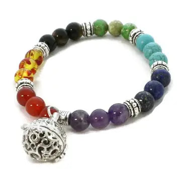 bracelet with chakra stone colors of red, yellow, black, green, turquoise, blue & purple, with lava bead inside of silver ball attached.