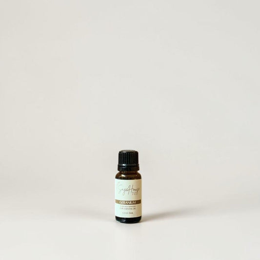Amber bottle with label on a grey background.