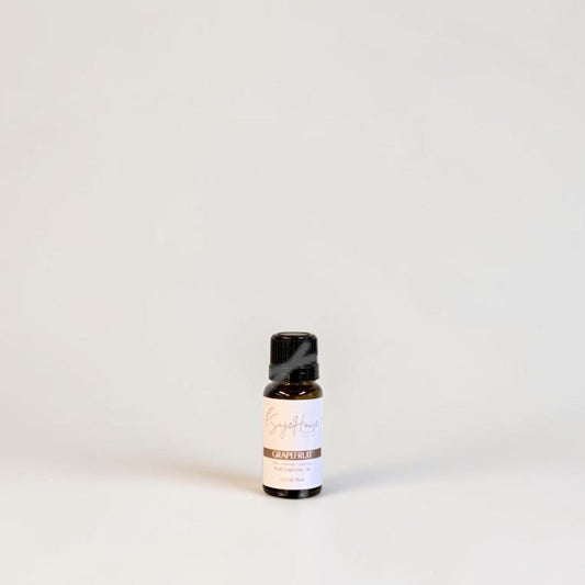 Amber bottle with label on a grey background.