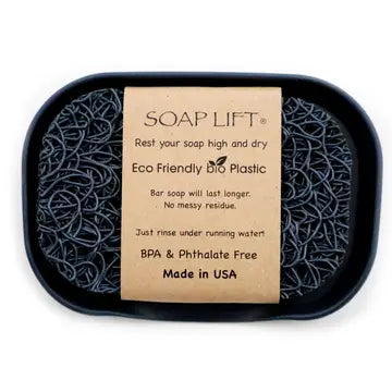 Gray colored soap dish with soap lift sitting inside. Soap lift sold seperately. On a white background