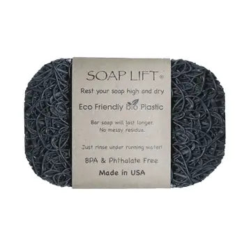 A gray soap lift with product band around the middle. On white background.