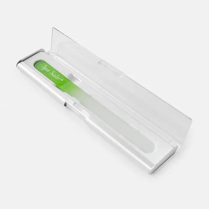 A green and white glass nail file presented in a sleek, compact case.